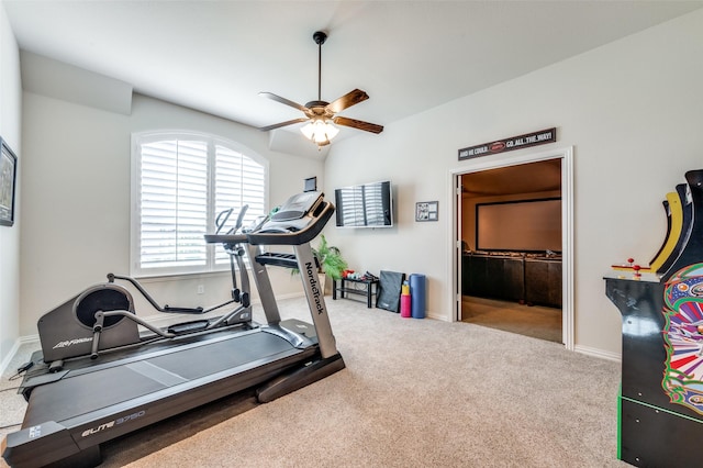 workout room with baseboards, carpet, and ceiling fan