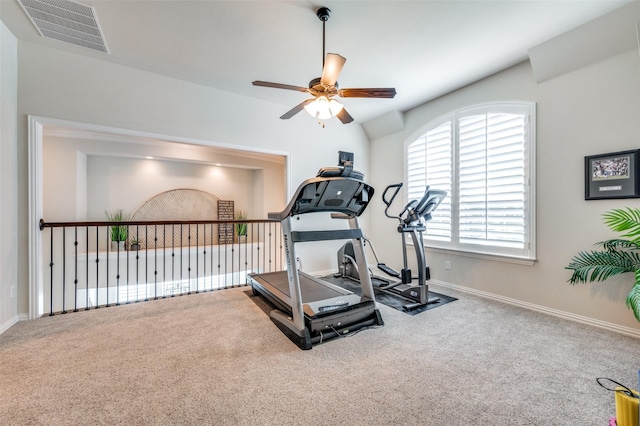 workout room featuring ceiling fan, visible vents, baseboards, and carpet