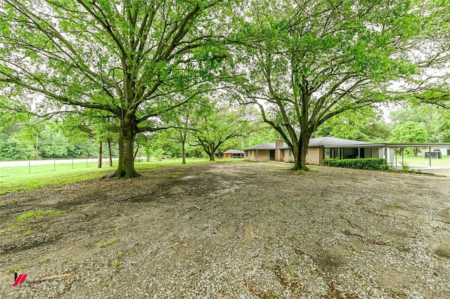 view of yard with fence