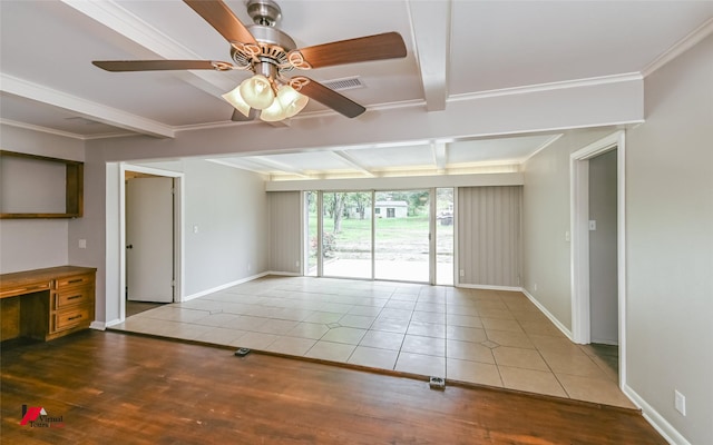 tiled spare room featuring crown molding, beam ceiling, a ceiling fan, baseboards, and visible vents