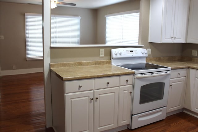 kitchen with white cabinets, a ceiling fan, light countertops, and white electric range