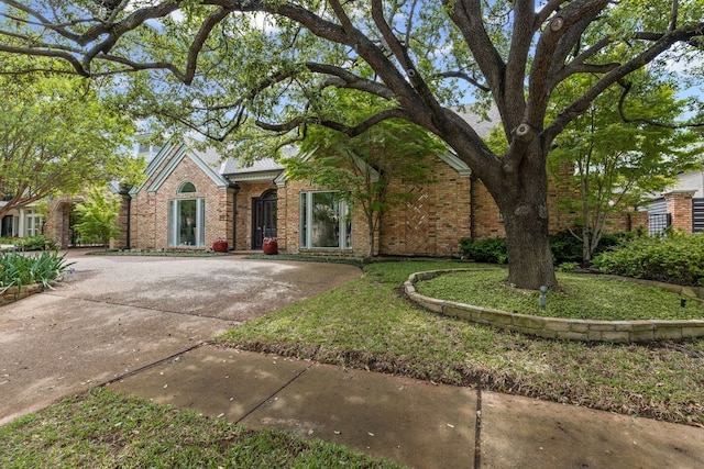 view of front of property featuring brick siding