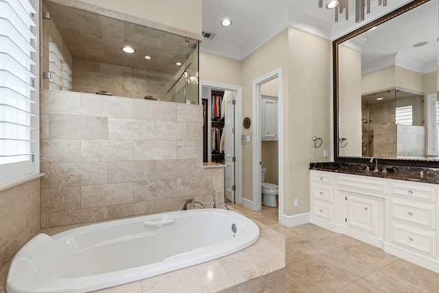 bathroom with ornamental molding, a stall shower, toilet, and a bath