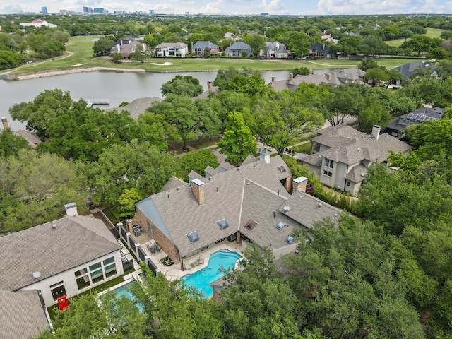 birds eye view of property featuring a residential view and a water view