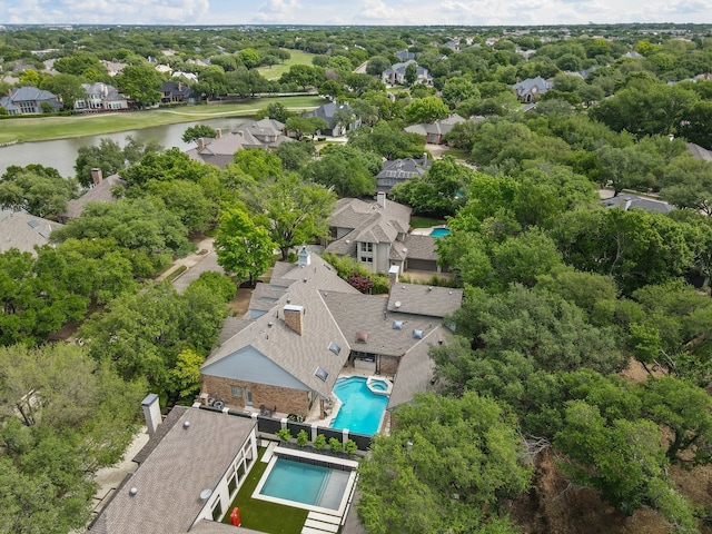 aerial view featuring a water view and a residential view