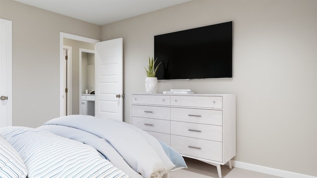 bedroom featuring baseboards