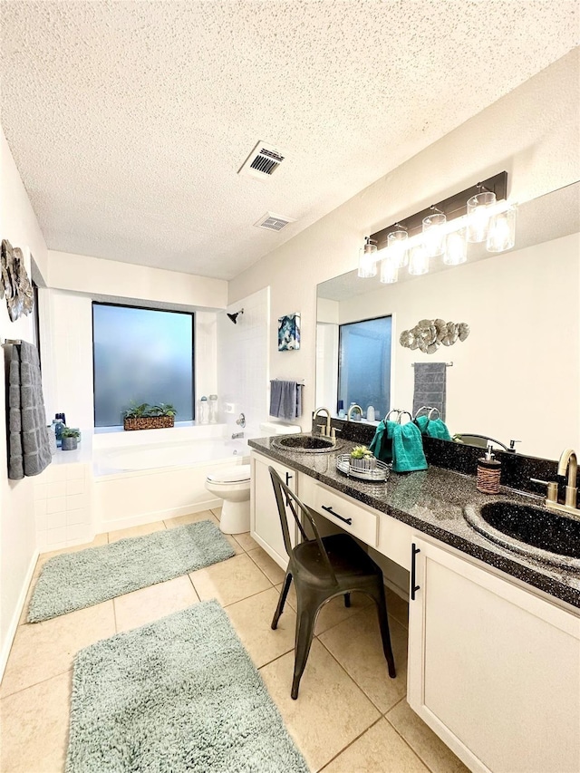 full bath with visible vents, a sink, tile patterned floors, and double vanity