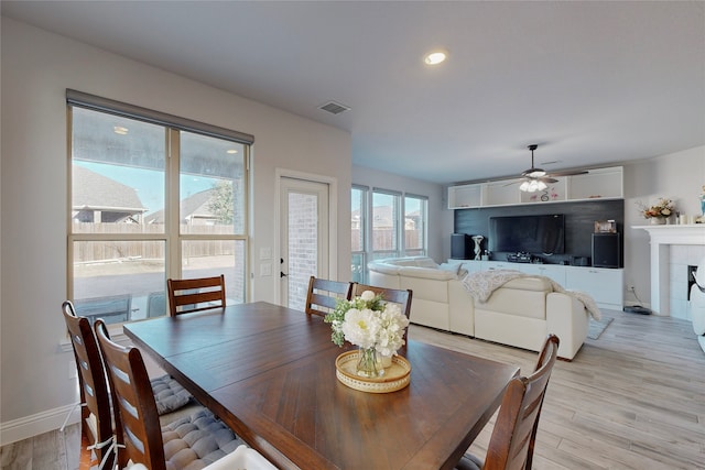 dining space featuring ceiling fan, light wood finished floors, recessed lighting, baseboards, and visible vents