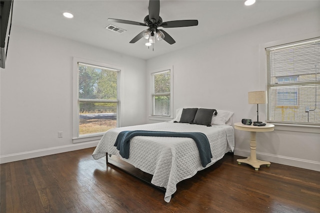 bedroom featuring visible vents, wood finished floors, baseboards, recessed lighting, and a ceiling fan