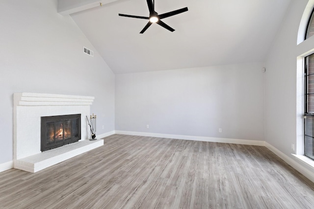 1308 Wheatfield Dr, Mesquite, TX 75149 - unfurnished living room with visible vents, a ceiling fan, wood finished floors, and vaulted ceiling