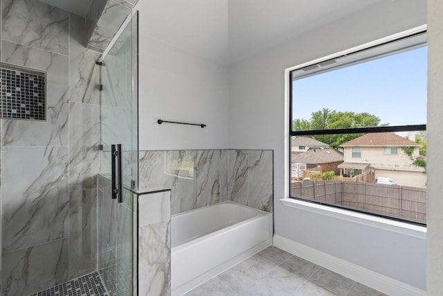 1308 Wheatfield Dr, Mesquite, TX 75149 - bathroom with a marble finish shower, baseboards, and a garden tub