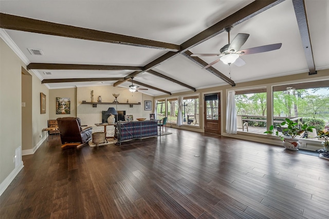 living area with visible vents, wood finished floors, baseboards, ceiling fan, and vaulted ceiling with beams