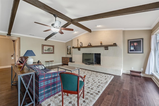 living room featuring visible vents, baseboards, ceiling fan, and wood finished floors