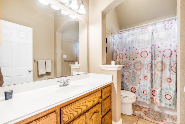 full bath with tile patterned flooring, vanity, toilet, and a shower with curtain