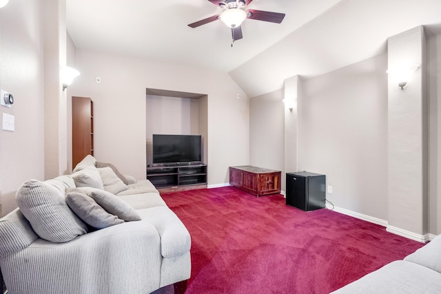 living room featuring carpet floors, ceiling fan, baseboards, and lofted ceiling