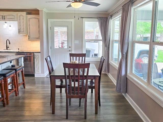 4512 Orchid St, Shreveport, LA 71105 - dining area with a ceiling fan, dark wood-style flooring, baseboards, and ornamental molding