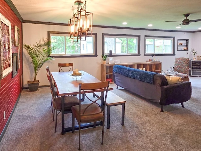 4512 Orchid St, Shreveport, LA 71105 - carpeted dining space featuring crown molding, a chandelier, a ceiling fan, and recessed lighting