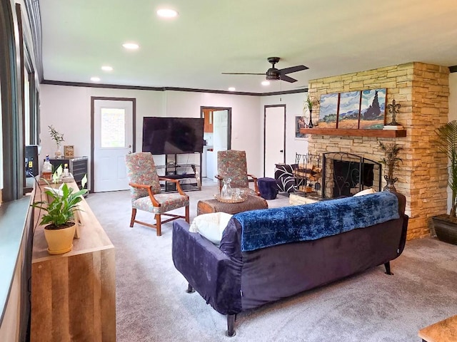 4512 Orchid St, Shreveport, LA 71105 - carpeted living area with a stone fireplace, crown molding, recessed lighting, and ceiling fan