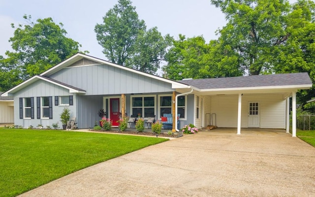 4512 Orchid St, Shreveport, LA 71105 - single story home featuring driveway, a porch, a front yard, and an attached carport