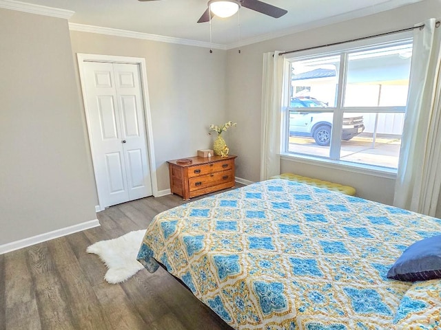 4512 Orchid St, Shreveport, LA 71105 - bedroom featuring wood finished floors, ornamental molding, baseboards, a closet, and a ceiling fan