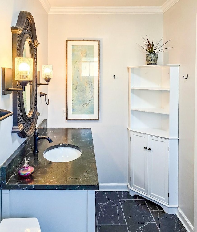 4512 Orchid St, Shreveport, LA 71105 - bathroom featuring marble finish flooring, baseboards, crown molding, and vanity