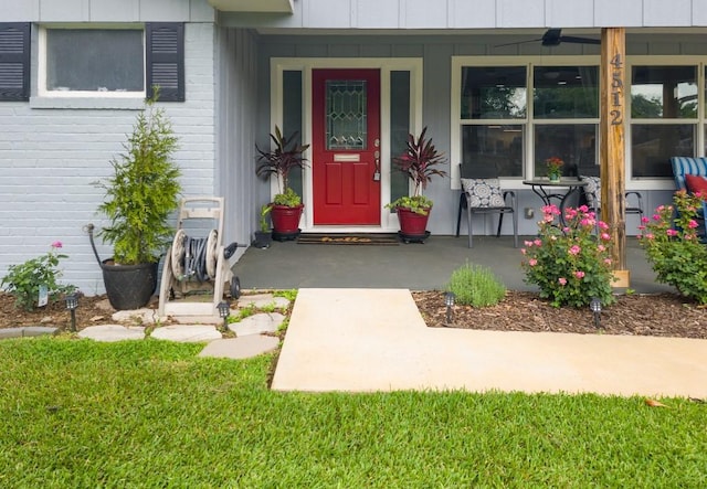 4512 Orchid St, Shreveport, LA 71105 - entrance to property featuring covered porch and board and batten siding