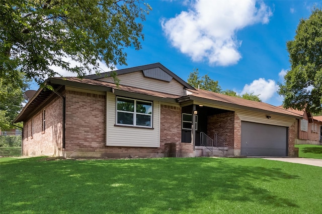 ranch-style home with a front yard and brick siding
