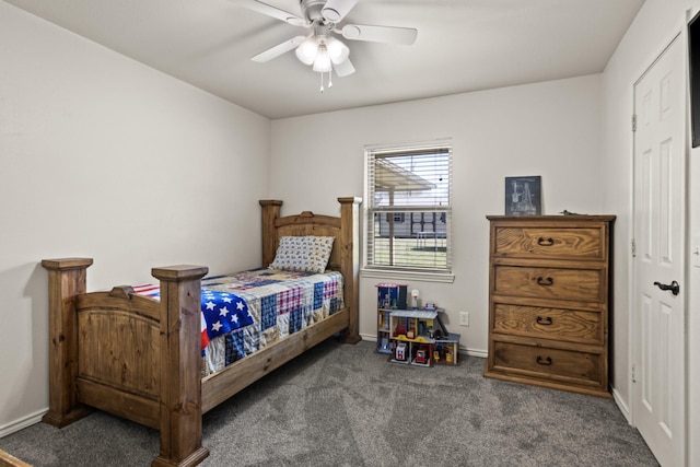 bedroom with carpet floors, baseboards, and a ceiling fan