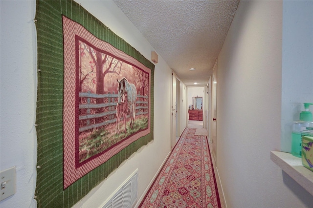 4405 Tophill Ln, Irving, TX 75038 - corridor with baseboards and a textured ceiling