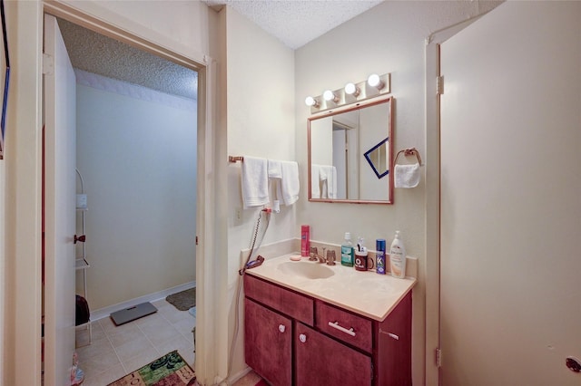 4405 Tophill Ln, Irving, TX 75038 - bathroom featuring a textured ceiling, tile patterned floors, and vanity