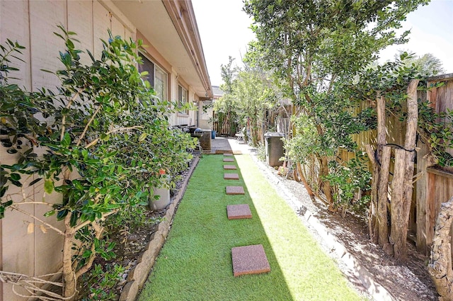 4405 Tophill Ln, Irving, TX 75038 - view of yard with fence and central AC unit