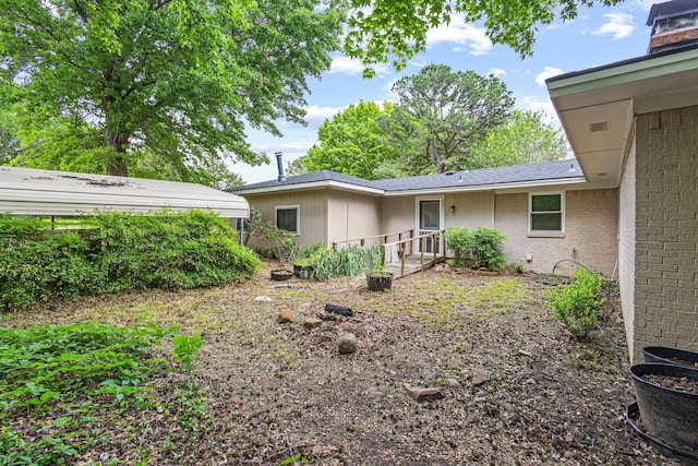 back of property with brick siding