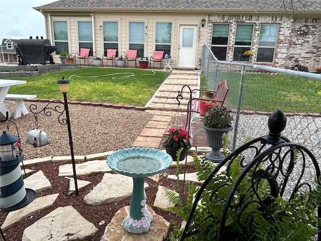 view of patio / terrace featuring fence