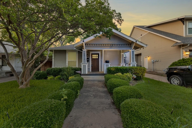 5513 Willis Ave, Dallas, TX 75206 - view of front of home with a porch and a lawn
