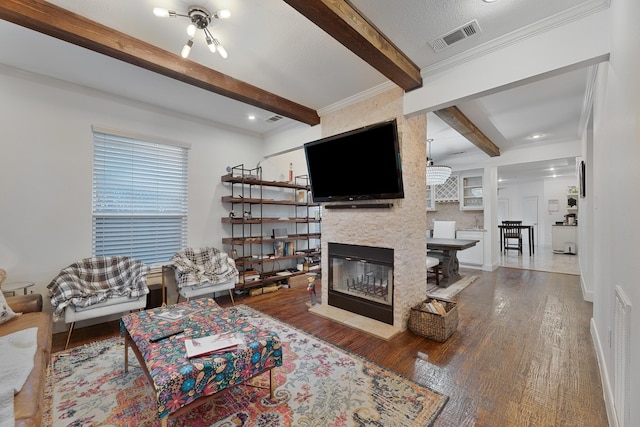 5513 Willis Ave, Dallas, TX 75206 - living room with beamed ceiling, wood finished floors, a large fireplace, and baseboards