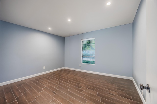 703 Athenia Way, Duncanville, TX 75137 - empty room featuring recessed lighting, baseboards, and dark wood-type flooring