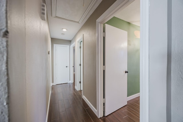 703 Athenia Way, Duncanville, TX 75137 - corridor with attic access, wood finish floors, and baseboards