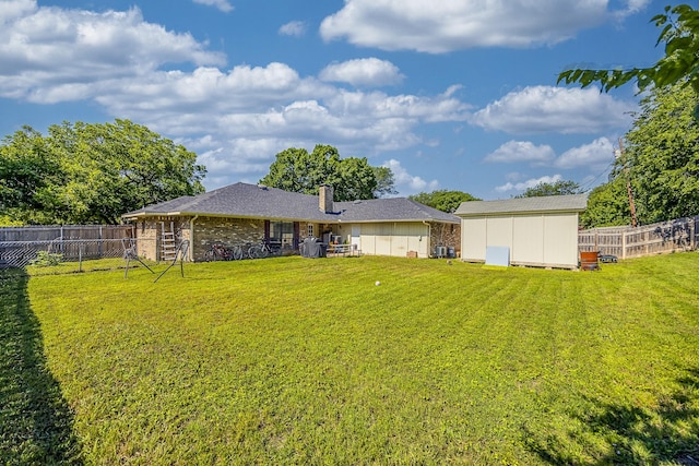 703 Athenia Way, Duncanville, TX 75137 - rear view of property featuring a chimney