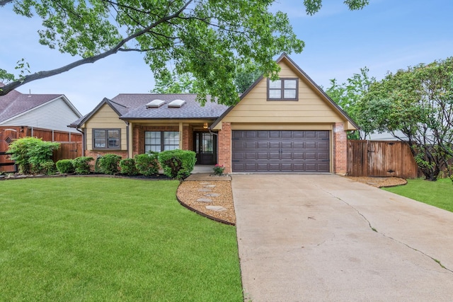 view of front of house featuring fence, concrete driveway, and brick siding