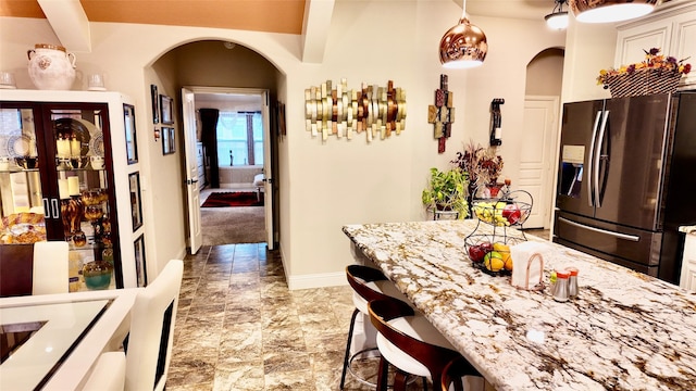 4010 Knightsbridge Ln, Midlothian, TX 76065 - interior space with baseboards, arched walkways, and marble finish floor