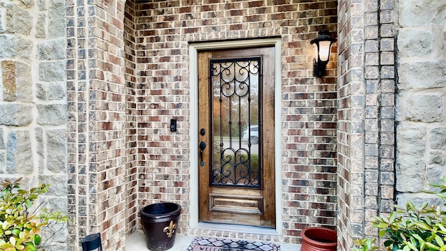 4010 Knightsbridge Ln, Midlothian, TX 76065 - doorway to property with brick siding