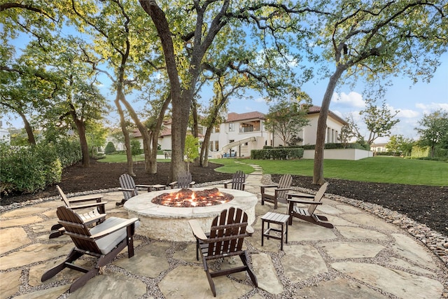 view of patio featuring an outdoor fire pit
