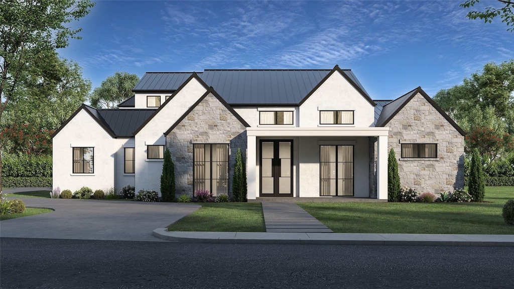 view of front facade featuring stucco siding, metal roof, stone siding, and a standing seam roof
