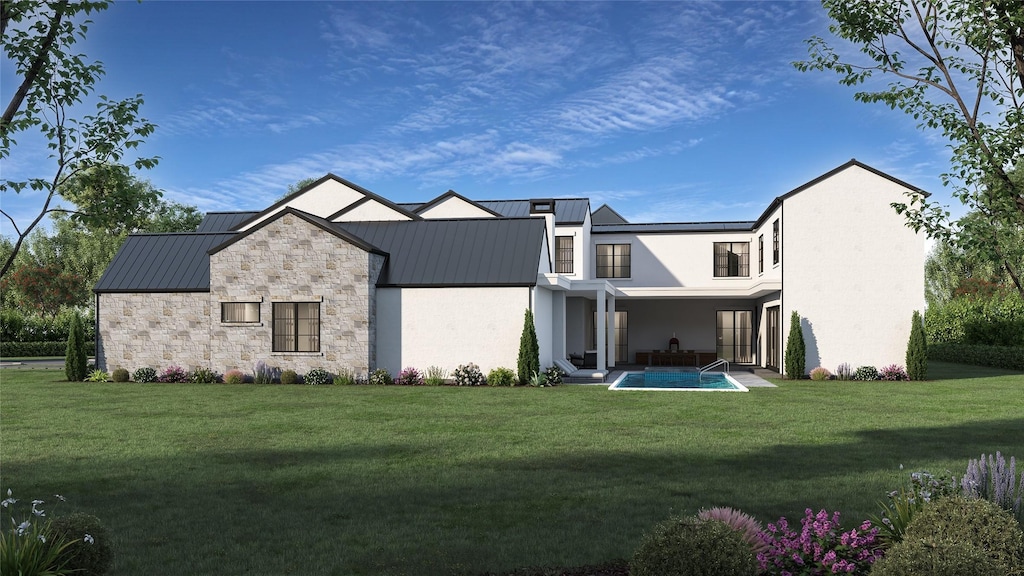 rear view of house featuring stucco siding, a standing seam roof, a patio area, metal roof, and a lawn
