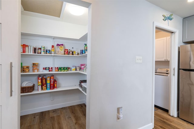 storage area with washer / clothes dryer