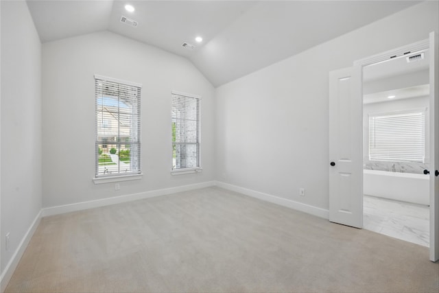 1851 Rosedale Ave, Van Alstyne, TX 75495 - interior space with baseboards, carpet flooring, visible vents, and vaulted ceiling