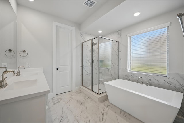 1851 Rosedale Ave, Van Alstyne, TX 75495 - full bath featuring a marble finish shower, a freestanding bath, visible vents, and a sink