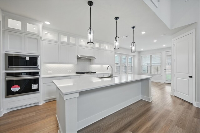 1851 Rosedale Ave, Van Alstyne, TX 75495 - kitchen featuring light countertops, stainless steel appliances, recessed lighting, and a sink