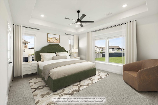 801 Daisy Corner Dr, Little Elm, TX 76227 - carpeted bedroom featuring a tray ceiling, recessed lighting, baseboards, and a ceiling fan
