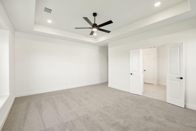 801 Daisy Corner Dr, Little Elm, TX 76227 - unfurnished bedroom with a raised ceiling, carpet floors, recessed lighting, baseboards, and a ceiling fan